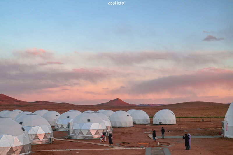 Dome tents at sunset in the desert